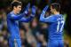 LONDON, ENGLAND - FEBRUARY 09: Eden Hazard of Chelsea is congratulated on the second goal by Oscar during the Barclays Premier League match between Chelsea and Wigan Athletic at Stamford Bridge on February 9, 2013 in London, England. (Photo by Laurence Griffiths/Getty Images)