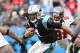 Nov 18, 2012; Charlotte, NC, USA; Carolina Panthers quarterback Cam Newton (1) with the ball as Tampa Bay Buccaneers defensive end Da'Quan Bowers (91) defends. The Buccaneers defeated the Panthers 27-21 at Bank of America Stadium. Mandatory Credit: Bob Donnan-USA TODAY Sports
