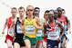 MOSCOW, RUSSIA - AUGUST 13: Ben St.Lawrence of Australia runs alongside Mohamed Farah of Great Britain as he competes during the Men's 5000 metres heats during Day Four of the 14th IAAF World Athletics Championships Moscow 2013 at Luzhniki Stadium on August 13, 2013 in Moscow, Russia. (Photo by Christian Petersen/Getty Images)