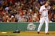 BOSTON, MA - JULY 21: Mike Napoli #12 of the Boston Red Sox reacts after striking out against the New York Yankees during the game on July 21, 2013 at Fenway Park in Boston, Massachusetts. (Photo by Jared Wickerham/Getty Images)