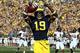 ANN ARBOR, MI - SEPTEMBER 15: Tight End Devin Funchess #19 of the University of Michigan Wolverines scores a touchdown in the first quarter during a Big Ten College football game against the University of Massachusetts Minutemen at Michigan Stadium on September 15, 2012 in Ann Arbor, Michigan. (Photo by Dave Reginek/Getty Images)