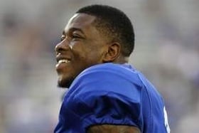 'Pit Bull' Mentality Endears Kentucky Running Back Kemp to Coaches