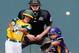SOUTH WILLAMSPORT, PA - AUGUST 26: Danny Marzo #12 of the West team from Petaluma, California hits a double as catcher Juan Crisp #13 of team Panama and umpire Martin Weber look on during the fifth inning of their Little League World Series consolation game on August 26, 2012 in South Willamsport, Pennsylvania. (Photo by Rob Carr/Getty Images)