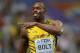 Aug 11, 2013; Moscow, RUSSIA; Usain Bolt (JAM) takes a victory lap after winning the 100m in 9.77 in the 14th IAAF World Championships in Athletics at Luzhniki Stadium. Mandatory Credit: Kirby Lee-USA TODAY Sports