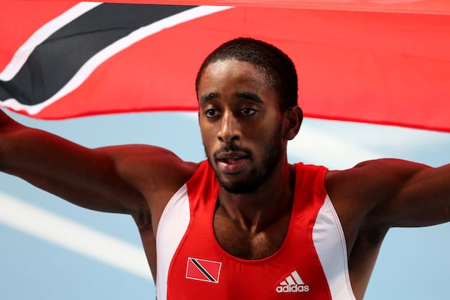Gordon Runs Down USA's Tinsley to Snatch Hurdles Gold