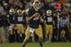 SOUTH BEND, IN - SEPTEMBER 22: Tommy Rees #11 of the Notre Dame Fighting Irish looks for a receiver against the Michigan Wolverines at Notre Dame Stadium on September 22, 2012 in South Bend, Indiana. Notre Dame defeated Michigan 13-6. (Photo by Jonathan Daniel/Getty Images)