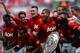 LONDON, ENGLAND - AUGUST 11: Phil Jones and Chris Smalling of Manchester United lead the celebrations with team mates after victory in the FA Community Shield match between Manchester United and Wigan Athletic at Wembley Stadium on August 11, 2013 in London, England. (Photo by Laurence Griffiths/Getty Images)