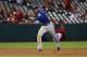 ANAHEIM, CA - AUGUST 07: Shortstop Elvis Andrus #1 of the Texas Rangers throws to first against the Los Angeles Angels of Anaheim at Angel Stadium of Anaheim on August 7, 2013 in Anaheim, California. (Photo by Jeff Gross/Getty Images)