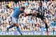 MANCHESTER, ENGLAND - MARCH 30: Steven Taylor of Newcastle United tries to block the header of Edin Dzeko of Manchester City during the Barclays Premier League match between Manchester City and Newcastle United at the Etihad Stadium on March 30, 2013 in Manchester, England. (Photo by Alex Livesey/Getty Images)