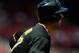 ST. LOUIS, MO - AUGUST 15: Andrew Lambo #57 of the Pittsburgh Pirates watches his first career RBI double against the St. Louis Cardinals in the fifth inning at Busch Stadium on August 15, 2013 in St. Louis, Missouri. Cardinals won 6-5 in twelve innings. (Photo by Jeff Curry/Getty Images)