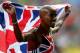 MOSCOW, RUSSIA - AUGUST 16: Mo Farah of Great Britain celebrates winning gold in the Men's 5000 metres final during Day Seven of the 14th IAAF World Athletics Championships Moscow 2013 at Luzhniki Stadium at Luzhniki Stadium on August 16, 2013 in Moscow, Russia. (Photo by Paul Gilham/Getty Images)