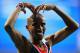 MOSCOW, RUSSIA - AUGUST 16: Mo Farah of Great Britain celebrates winning gold in the Men's 5000 metres final during Day Seven of the 14th IAAF World Athletics Championships Moscow 2013 at Luzhniki Stadium at Luzhniki Stadium on August 16, 2013 in Moscow, Russia. (Photo by Julian Finney/Getty Images)