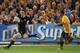 SYDNEY, AUSTRALIA - AUGUST 17: Ben Smith of the All Blacks runs past Quade Cooper of the Wallabies to score a try during The Rugby Championship Bledisloe Cup match between the Australian Wallabies and the New Zealand All Blacks at ANZ Stadium on August 17, 2013 in Sydney, Australia. (Photo by Mark Metcalfe/Getty Images)