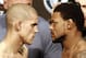Aug 16, 2013; Boston, MA, USA; Joe Lauzon (left) stares at Michael Johnson during the weigh-in for their UFC fight at TD Garden tomorrow night. Mandatory Credit: Winslow Townson-USA TODAY Sports