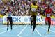 MOSCOW, RUSSIA - AUGUST 17: Usain Bolt of Jamaica crosses the line to win gold ahead of Adam Gemili of Great Britain and Curtis Mitchell of the United States in the Men's 200 metres final during Day Eight of the 14th IAAF World Athletics Championships Moscow 2013 at Luzhniki Stadium on August 17, 2013 in Moscow, Russia. (Photo by Jamie Squire/Getty Images)