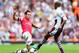 LONDON, ENGLAND - AUGUST 17: Santi Cazorla of Arsenal and Fabian Delph of Aston Villa battle for the ball during the Barclays Premier League match between Arsenal and Aston Villa at Emirates Stadium on August 17, 2013 in London, England. (Photo by Clive Mason/Getty Images)