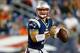 FOXBORO, MA - AUGUST 16: Tim Tebow #5 of the New England Patriots runs with the ball against the Tampa Bay Buccaneers in the second half during the game at Gillette Stadium on August 16, 2013 in Foxboro, Massachusetts. (Photo by Jared Wickerham/Getty Images)