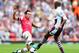 LONDON, ENGLAND - AUGUST 17: Santi Cazorla of Arsenal and Fabian Delph of Aston Villa battle for the ball during the Barclays Premier League match between Arsenal and Aston Villa at Emirates Stadium on August 17, 2013 in London, England. (Photo by Clive Mason/Getty Images)