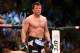 BOSTON, MA - AUGUST 17: Chael Sonnen reacts after winning the fight with a tap out by guillotine choke against Mauricio Rua in their light heavyweight bout at TD Garden on August 17, 2013 in Boston, Massachusetts. (Photo by Jared Wickerham/Getty Images)