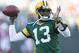 Aug 9, 2013; Green Bay, WI, USA; Green Bay Packers quarterback Vince Young (13) throws a pass during warmups prior to the game against the Arizona Cardinals at Lambeau Field. Mandatory Credit: Jeff Hanisch-USA TODAY Sports