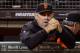 SAN FRANCISCO, CA - AUGUST 09: Manager Bruce Bochy #15 of the San Francisco Giants looks on from the dugout in the seventh inning against the Baltimore Orioles at AT&T Park on August 9, 2013 in San Francisco, California. (Photo by Thearon W. Henderson/Getty Images)