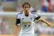 SWANSEA, WALES - AUGUST 01: Michu of Swansea in action during the UEFA Europa League third round qualifying first leg match between Swansea City and Malmo at the Liberty Stadium on August 1, 2013 in Swansea, Wales. (Photo by Michael Regan/Getty Images)