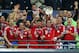 LONDON, ENGLAND - MAY 25: Bastian Schweinsteiger, Thomas Mueller and Philipp Lahm of Bayern Muenchen lift the trophy in celebration alongside team mates after victory in the UEFA Champions League final match between Borussia Dortmund and FC Bayern Muenchen at Wembley Stadium on May 25, 2013 in London, United Kingdom. (Photo by Alex Grimm/Getty Images)