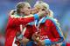 MOSCOW, RUSSIA - AUGUST 17: (L-R)Gold medalist Tatyana Firova and Kseniya Ryzhova of Russia kiss on the podium during the medal ceremony for the Women's 4x400 metres Relay during Day Eight of the 14th IAAF World Athletics Championships Moscow 2013 at Luzhniki Stadium on August 17, 2013 in Moscow, Russia. (Photo by Paul Gilham/Getty Images)