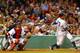 Alex Rodriguez (right) had the last laugh last night, as New York defeated Boston 9-6.