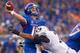 BOISE, ID - SEPTEMBER 20: Joe Southwick #16 of the Boise State Broncos throws just ahead of a hit by Preston Hadley #7 of the BYU Cougars at Bronco Stadium on September 20, 2012 in Boise, Idaho. (Photo by Otto Kitsinger III/Getty Images)
