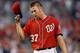 WASHINGTON, DC - AUGUST 11: Starting pitcher Stephen Strasburg #37 of the Washington Nationals celebrates after pitching his first complete game as the Nationals defeated the Philadelphia Phillies 6-0 during a game at Nationals Park on August 11, 2013 in Washington, DC. (Photo by Patrick McDermott/Getty Images)