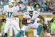 Aug 9, 2013; Jacksonville, FL, USA; Miami Dolphins running back Daniel Thomas (33) runs with the ball during the first quarter against the Jacksonville Jaguars at EverBank Field. Mandatory Credit: Kim Klement-USA TODAY Sports