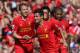 LIVERPOOL, ENGLAND - MAY 19: Coutinho of Liverpool celebrates scoring the opening goal with team-mate Lucas (l) during the Barclays Premier League match between Liverpool and Queens Park Rangers at Anfield on May 19, 2013 in Liverpool, England. (Photo by Julian Finney/Getty Images)