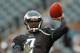 PHILADELPHIA, PA - OCTOBER 28: Quarterback Michael Vick #7 of the Philadelphia Eagles makes a pass during warm ups before the start of their game against the Atlanta Falcons at Lincoln Financial Field on October 28, 2012 in Philadelphia, Pennsylvania. (Photo by Rich Schultz /Getty Images)