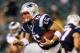 PHILADELPHIA, PA - AUGUST 09: Tim Tebow #5 of the New England Patriots carries the ball in the second half against the Philadelphia Eagles on August 9, 2013 at Lincoln Financial Field in Philadelphia, Pennslyvania. (Photo by Elsa/Getty Images)