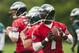 May 20, 2013; Philadelphia, PA, USA; Philadelphia Eagles quarterbacks Michael Vick (7) G.J. Kinne (4) fourth round draft pick Matt Barkley (2) and Nick Foles (9) drop back to pass during organized team activities at the NovaCare Complex. Mandatory Credit: Howard Smith-USA TODAY Sports
