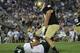 SOUTH BEND, IN - SEPTEMBER 03: Evan Landi #9 of the University of South Florida Bulls catches a touchdown pass under pressure from Carlo Calabrese #44 of the Notre Dame Fighting Irish at Notre Dame Stadium on September 3, 2011 in South Bend, Indiana. (Photo by Jonathan Daniel/Getty Images)