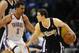 Apr 15, 2013; Oklahoma City, OK, USA; Sacrament Kings guard Jimmer Fredette (7) handles the ball against Oklahoma City Thunder guard Thabo Sefolosha (2) during the second half at Chesapeake Energy Arena. Mandatory Credit: Mark D. Smith-USA TODAY Sports