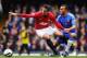 LONDON, ENGLAND - APRIL 01: Robin van Persie of Manchester United is closed down by Ryan Bertrand of Chelsea during the FA Cup with Budweiser Sixth Round Replay match between Chelsea and Manchester United at Stamford Bridge on April 1, 2013 in London, England. (Photo by Mike Hewitt/Getty Images)