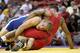 LAS VEGAS - JUNE 15: Ben Askren (blue) wrestles Tyrone Lewis (red) in the Freestyle 74kg division championship match during the USA Olympic trials for wrestling and judo on June 15, 2008 at the Thomas & Mack Center in Las Vegas, Neveda. (Photo by Jonathan Ferrey/Getty Images)