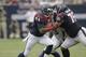 HOUSTON, TX - DECEMBER 23: Ben Tate #44 of the Houston Texans rushes past the block of Duane Brown #76 of the Houston Texans at Reliant Stadium on December 23, 2012 in Houston, Texas. Minnesota Vikings defeat the Houston Texans 23-6. (Photo by Bob Levey/Getty Images)
