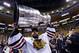 Jun 24, 2013; Boston, MA, USA; Chicago Blackhawks goalie Corey Crawford (50) hoists the Stanley Cup after game six of the 2013 Stanley Cup Final against the Boston Bruins at TD Garden. The Blackhawks won 3-2 to win the series four games to two. Mandatory Credit: Greg M. Cooper-USA TODAY Sports