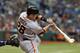 ST. PETERSBURG, FL - AUGUST 4: Designated hitter Buster Posey #28 of the San Francisco Giants bats in the first inning against the Tampa Bay Rays August 4, 2013 at Tropicana Field in St. Petersburg, Florida. (Photo by Al Messerschmidt/Getty Images)