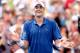 CINCINNATI, OH - AUGUST 17: John Isner celebrates his win over Juan Martin Del Potro of Argentina during the semifinals of the Western & Southern Open on August 17, 2013 at Lindner Family Tennis Center in Cincinnati, Ohio. (Photo by Matthew Stockman/Getty Images)