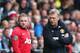 SWANSEA, WALES - AUGUST 17: David Moyes (R) the manager of Manchester United passes on final instructions as Wayne Rooney (L) comes on as a substitute during the Barclays Premier League match between Swansea City and Manchester United at the Liberty Stadium on August 17, 2013 in Swansea, Wales. (Photo by Michael Steele/Getty Images)