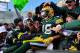 Nov 4, 2012; Green Bay, WI, USA; Green Bay Packers wide receiver Randall Cobb (18) celebrates a touchdown with fans during the game against the Arizona Cardinals at Lambeau Field. Mandatory Credit: Benny Sieu-USA TODAY Sports