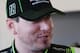 Kyle Busch smiles while being interviewed after securing the pole in Daytona. Credit: Dwight Drum