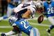 DETROIT, MI - AUGUST 22: Kanorris Davis #44 of the New England Patriots fumbles the ball after being hit by Glover Quin #27 of the Detroit Lions during the first quarter during a pre season game at Ford Field on August 22, 2013 in Detroit, Michigan. (Photo by Gregory Shamus/Getty Images)