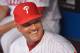 PHILADELPHIA, PA - AUGUST 16: Manager Ryne Sandberg #23 of the Philadelphia Philliesat smiles while sitting in the dugout before the game against the Los Angeles Dodgers Citizens Bank Park on August 16, 2013 in Philadelphia, Pennsylvania. (Photo by Drew Hallowell/Getty Images)