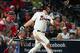 ATLANTA, GA - AUGUST 17: Brian McCann #16 of the Atlanta Braves hits a sixth inning two-run home run against the Washington Nationals at Turner Field on August 17, 2013 in Atlanta, Georgia. (Photo by Scott Cunningham/Getty Images)
